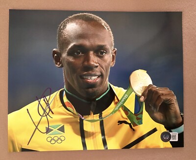 Usain Bolt Signed 8x10 Photo. Jamaica Olympics. Track & Field Beckett COA. A35