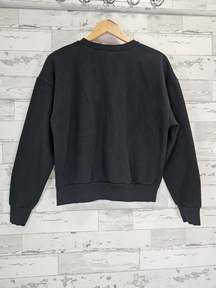 Sudadera para mujer Zara pequeña negra abstracta retrato arte facial bordado Foto 3 de 4