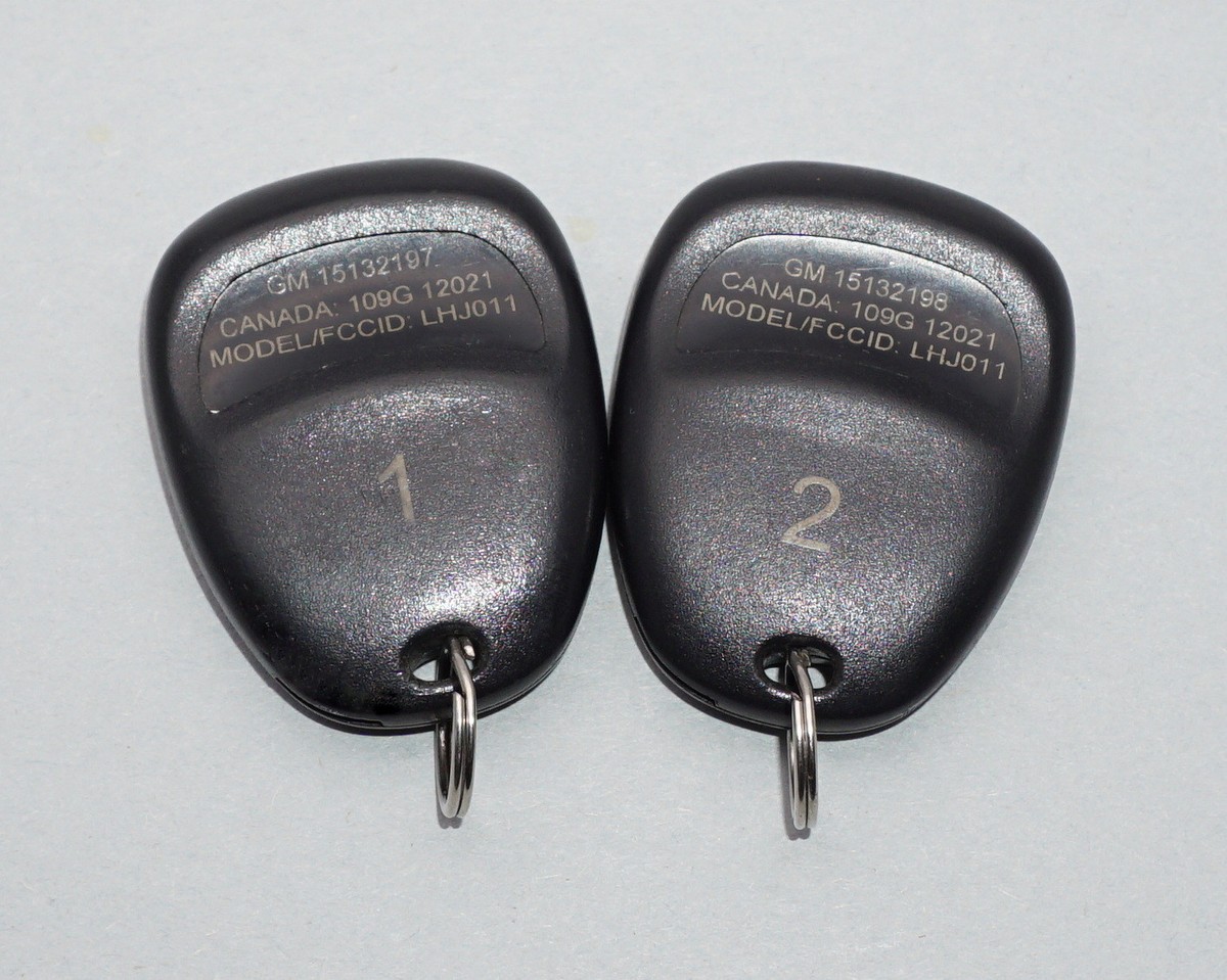 OEM MATCHED PAIR GM GMC CHEVY KEYLESS ENTRY REMOTE FOBS LHJ011  