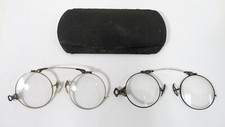 LOT OF 2 ANTIQUE SPECTACLES SPRING BRIDGE STERLING SILVER & UNKNOWN METAL
