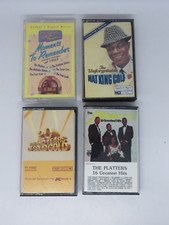 LOT OF 4 OLDIES CASSETTES...NAT KING COLE, PLATTERS, SOLID GOLD, MOMENTS TO REME