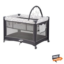 Elegant Portable Baby Playard with Detachable Bassinet - Perfect for Travel