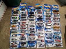 72 Car Case Of Hot Wheels Including 2 Treasure Hunts All As Pictured. Optimus
