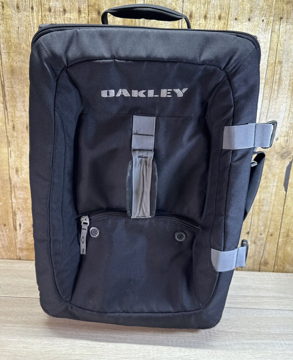 Oakley Black Canvas Rolling Wheeled Carry On Luggage Duffel