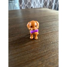 Replacement dog Barbie with purple bone.