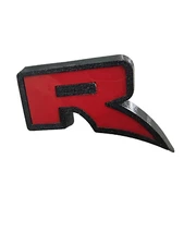 "R" logo on the front grille of the FORD Next-gen Ranger Raptor (2022-Present)