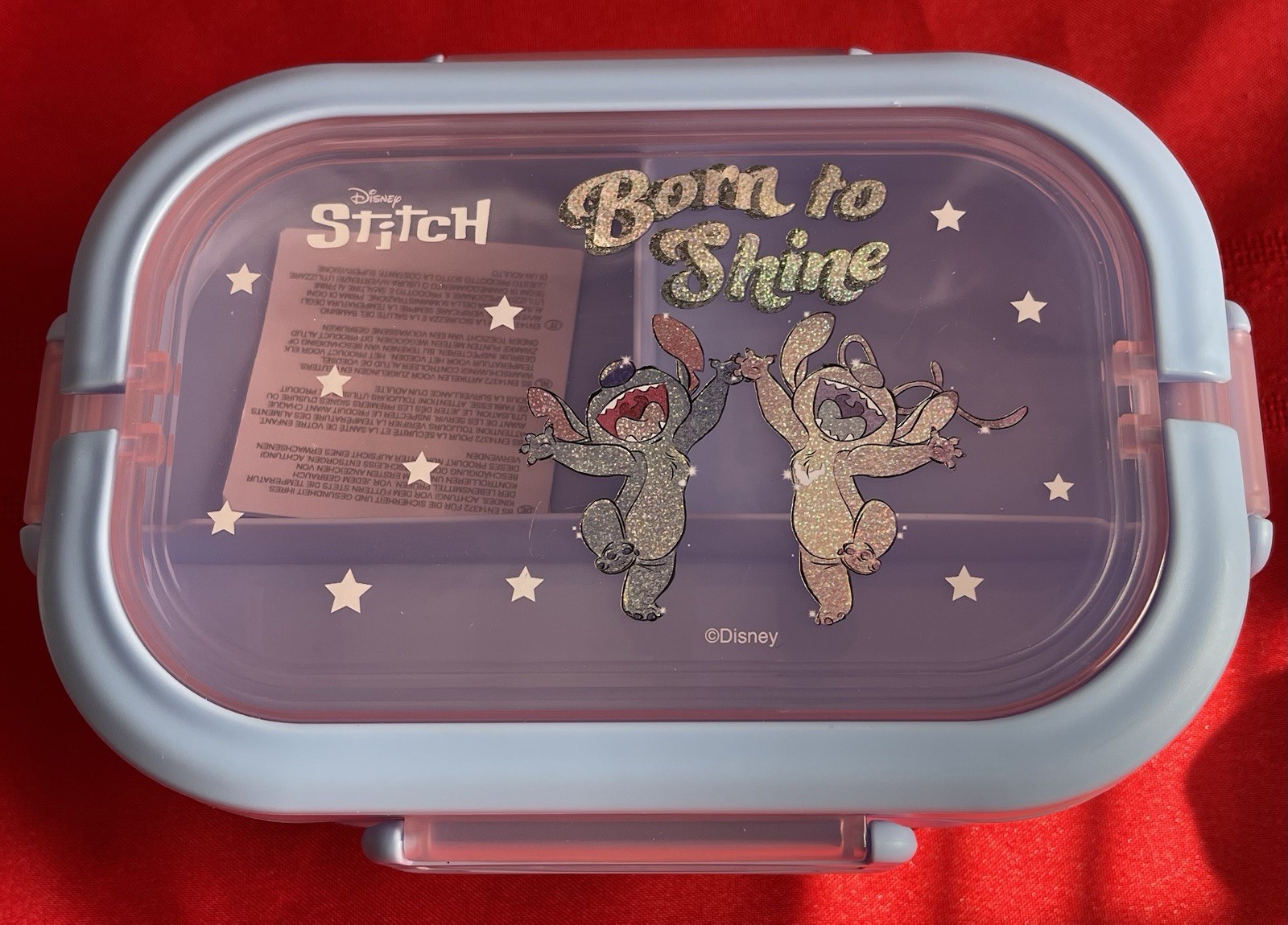Featuring The Characters Stitch And Angel.