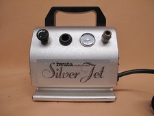 See video Iwata studio series Silver Jet model ac-27 air compressor airbrush tan