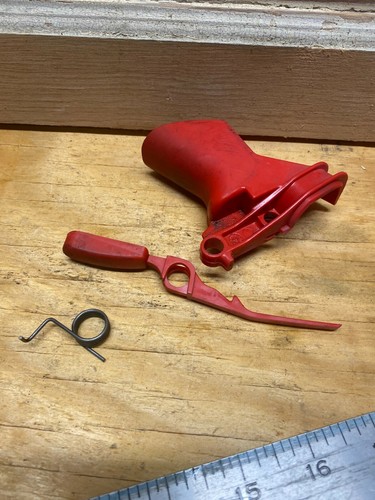 A used Trigger Assembly from a Homelite Versa Tool trimmer power head - Picture 2 of 2