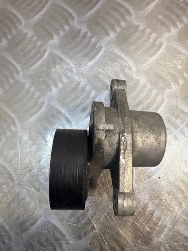 Alternator belt tensioner