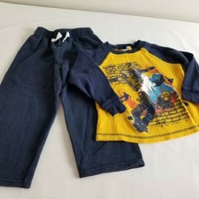 Yellow skateboarding printed shirt and Garanimals pants