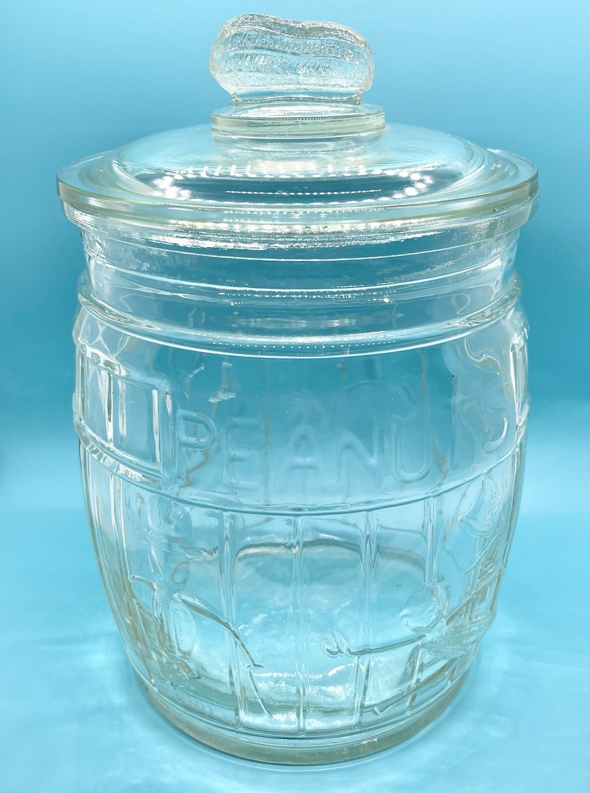Reproduction Running Mr Peanut Glass Barrel Jar with Peanut Finial Lid