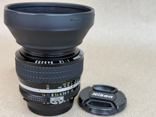 Nikon 50mm F/1.2 AIS Nikkor MF Lens w/ caps , Hood & Filter- MINT - Picture 9 of 10