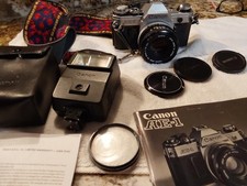 Vintage Lot Canon AE-1 35mm, original receipt and accessories- hardly used 