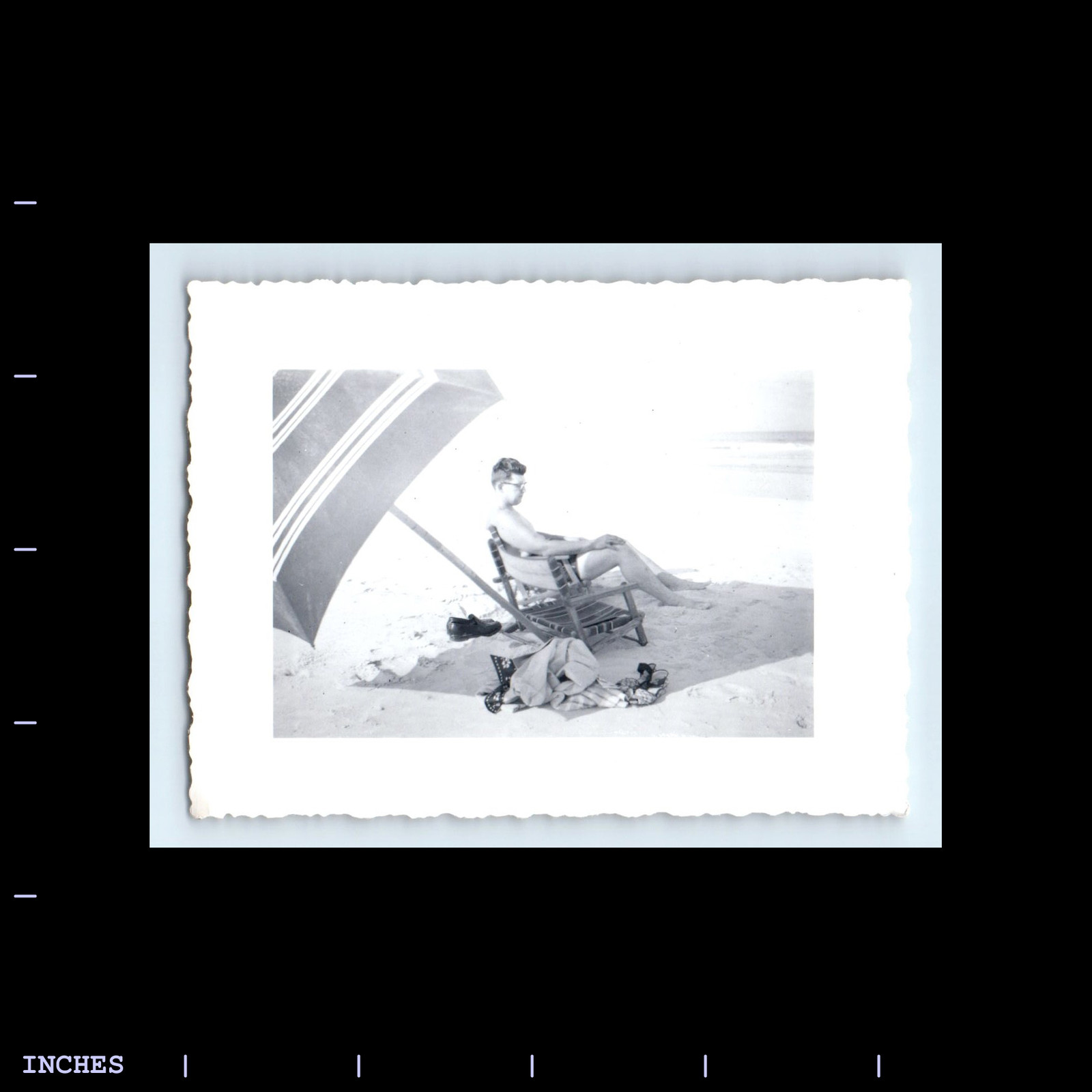 Vintage Beach Scene Man Sunbathing Under Umbrella Retro Photo