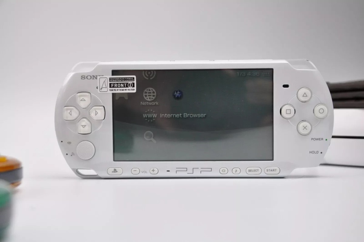 Sony PSP 1000 Handheld Console with 32GB and Charger cable Region