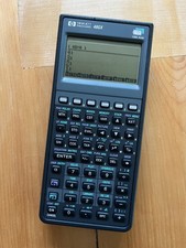 HP 48GX Graphing Calculator w/ Case and User's Guide. 128K RAM. Tested Working.