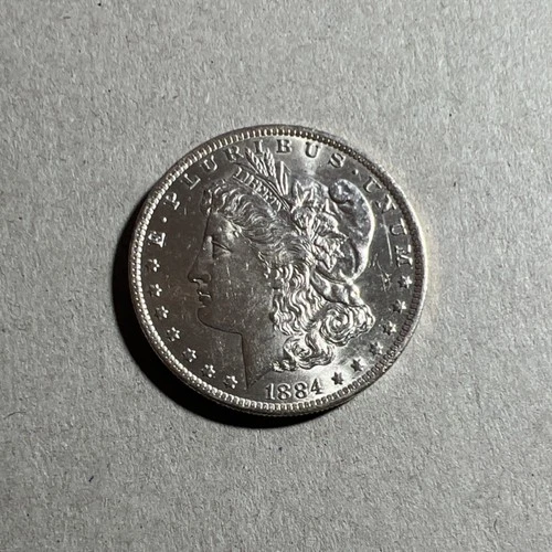 1884 Morgan Silver Dollar $1 0.9 Fineness 90% Silver New Orleans Coin