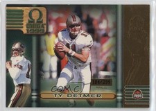 1999 Pacific Omega Gold 104/299 Ty Detmer #58 un2