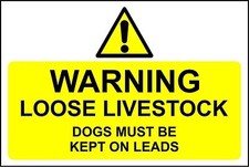 Warning loose livestock dogs must be kept on leads safety sign 
