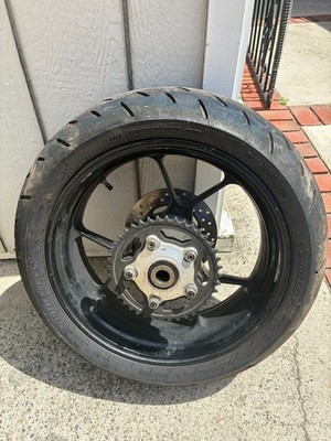 Aprilia RSV1000R Factory Rear wheel, brake rotor, sprocket, tire (complete)