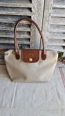 PETIT SAC LONGCHAMP CUIR ET TISSU BEIGE - Photo 1/4