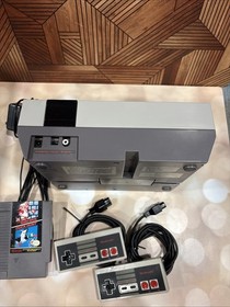 Nintendo NES Console 2 OEM Controllers With Super Mario Bros. And Duck Hunt