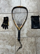 Ektelon racketball racket with glove and glasses.