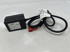SL06-04-01 Battery Charger Kid Trax / Motion Trends 7V---0.8A
