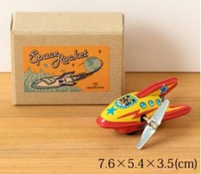 A fun tin rocket with a spinning motion - Space Z Yellow Tin toy Space rocket