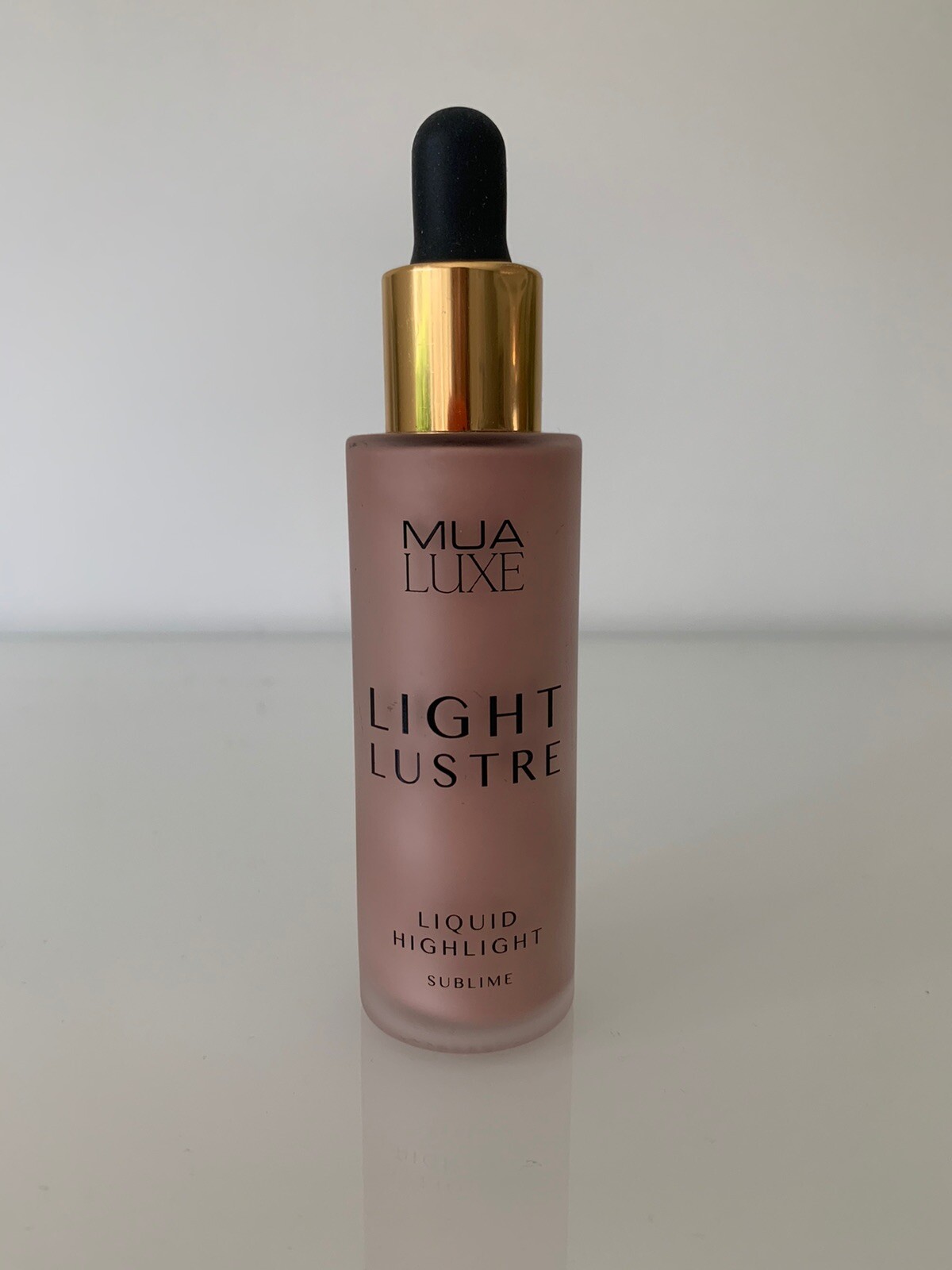 mua light lustre liquid highlighter
