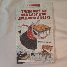 There Was an Old Lady Who Swallowed a Desk by Lucille Colandro 2014 PAPERBACK