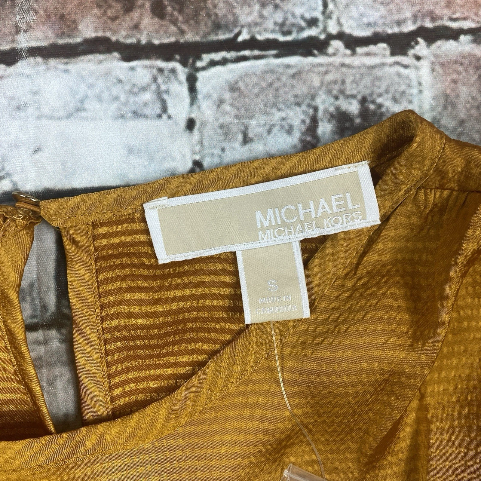 Abito Michael Kors donna S calendula oro avvolgente testurizzato manica a palloncino raso