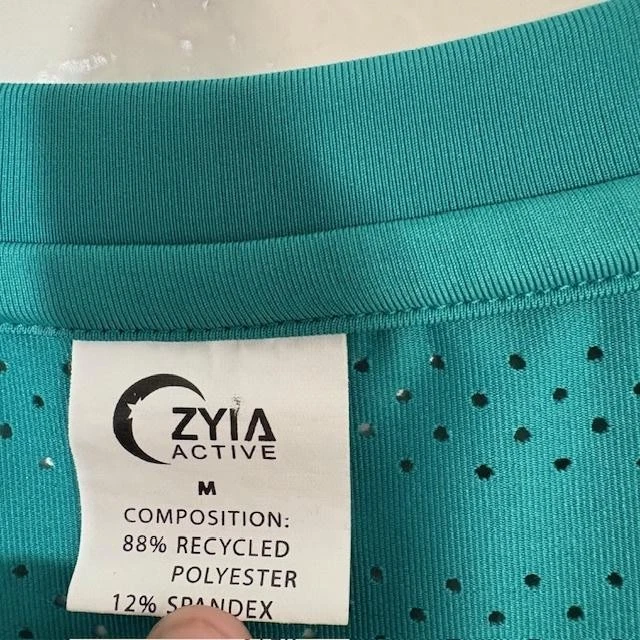 Camisa deportiva perforada Zyia Active para mujer verde azulado mediana manga larga Foto 3 de 4