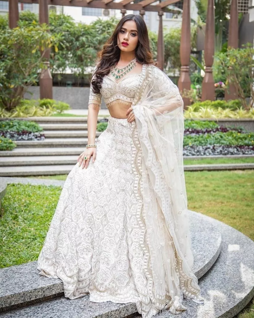 Riddhi Sud - Classic Luxury Silk Georgette Draped Lehenga Saree in white  with blouse enhanced mesmerizing couching details in golden dori and  katdana embroidery. Handcrafted to perfection. Nothing speaks royal better  than