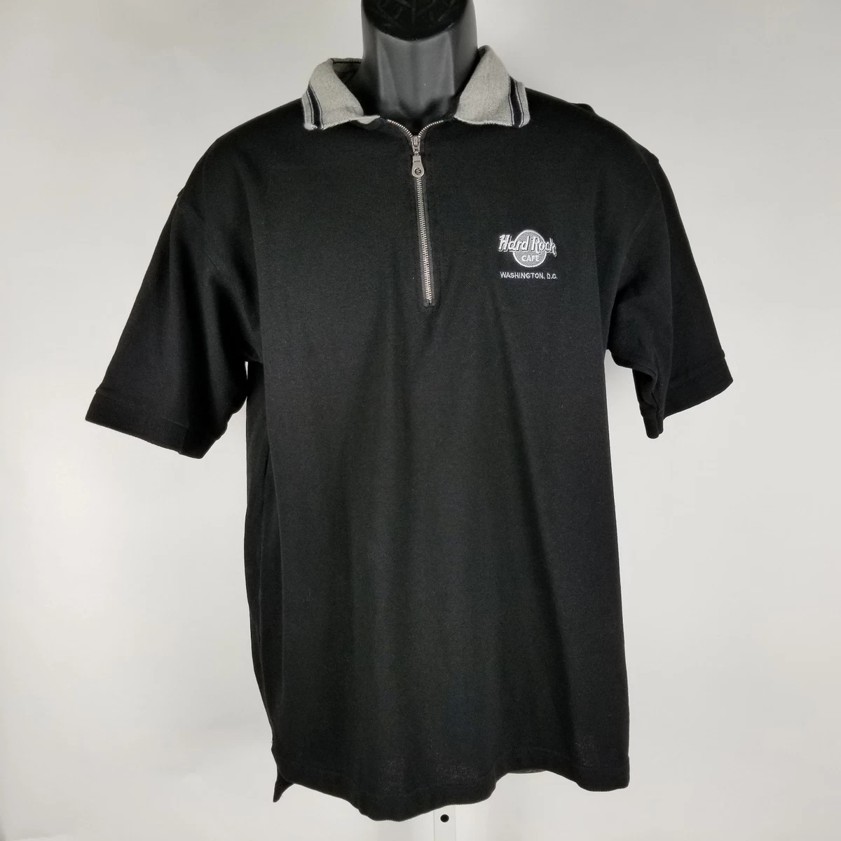 The rock top black polo