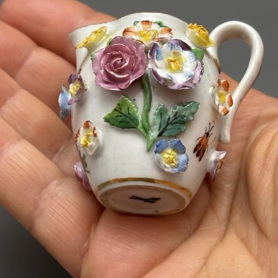 ANTIQUE MEISSEN PORCELAIN MINIATURE CREAMER ENCRUSTED WITH FLOWERS