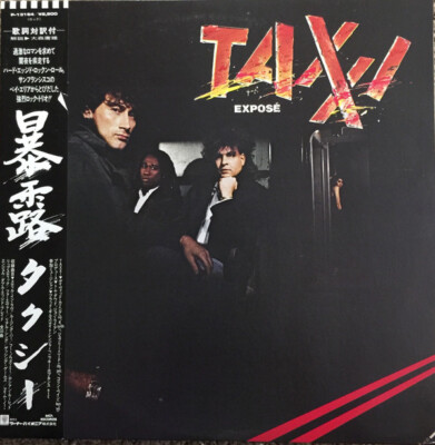 Taxxi - Expose 1985 LP, Album MCA Records P-13164 Near Mint (NM or M-)