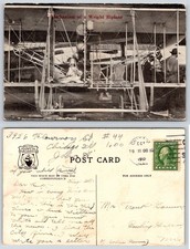 Wright Flyer Mechanism & Wright Brothers ??? Shown In Background Postcard ZF1