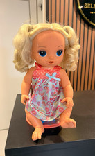 Baby Girl Play Doll Blue Eyes Blonde Curly Hair Light Complexion Plastic
