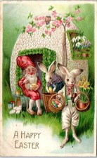 1908 A Happy Easter Dressed Bunnies and an Elf in an Egg Caravan Postcard
