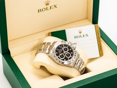 Rolex Daytona Ref. 116520 LC100 neu verklebt mit Erstkaufrechnung von 2016