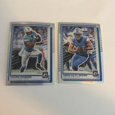 2025 Donruss Optic Detroit Lions Calvin Johnson And Amon-Ra St Brown Prizm Holo