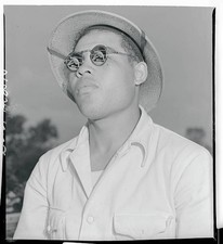 Joe Louis heavyweight boxing champion stares into sun behind dark - Old Photo