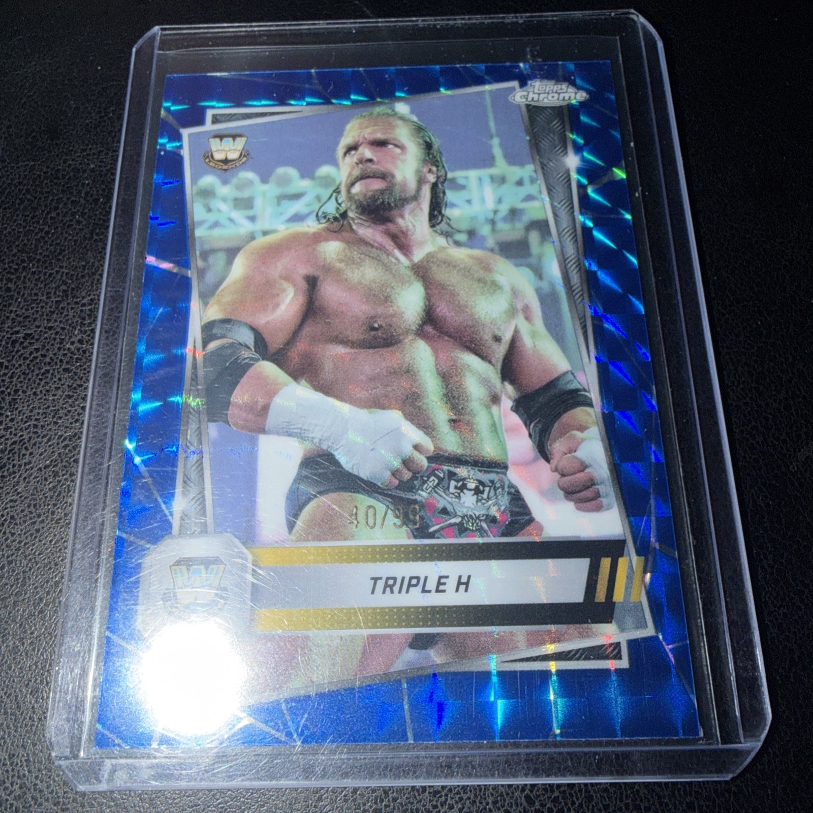 2025 Topps Chrome WWE Triple H Blue Geometric Refractor /99 #22