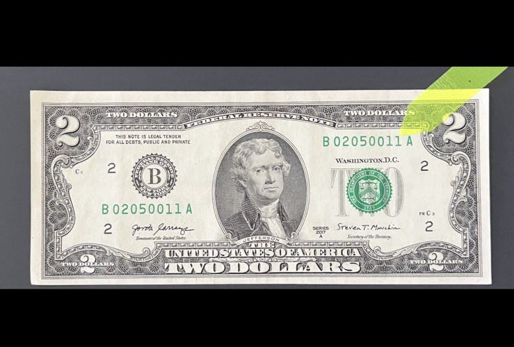 ERROR $2 DLL BILL - MISCUT MARGINS UNEVEN & PRINT SHIFT, SERIAL CLOSER TO TOP.