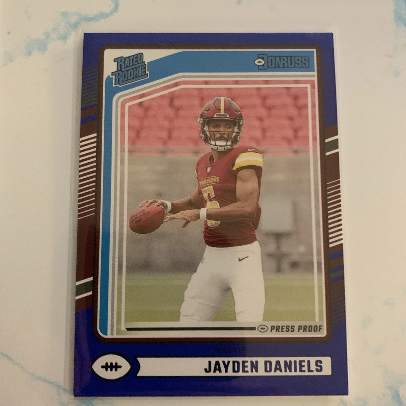 2024 Panini Donruss - Rated Rookie Jayden Daniels #389 Blue Press Proof (RC)