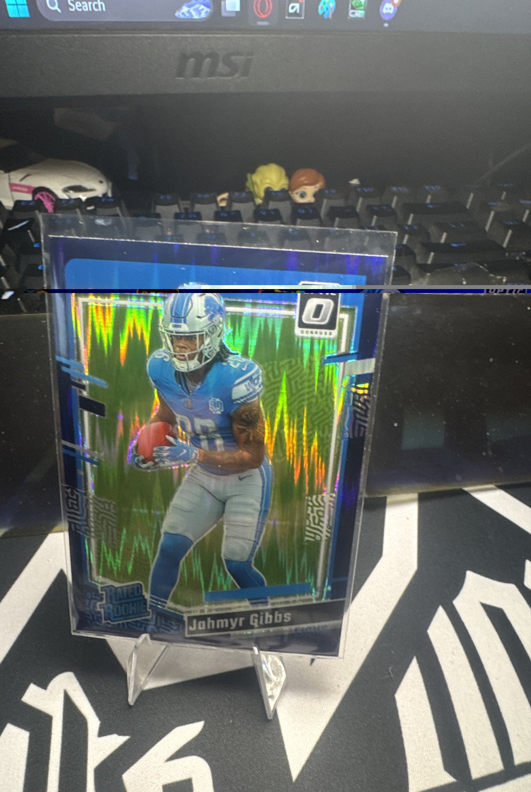 2023 Panini Donruss Optic - Rated Rookie Jahmyr Gibbs #236 Purple Shock Prizm RC