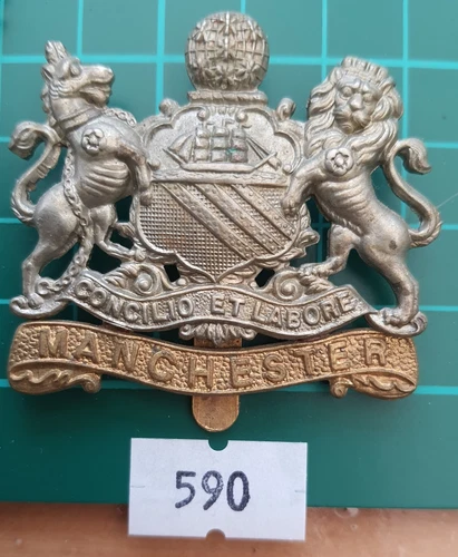 Original Cap Badge:590) WW1 Manchester Reg Bi-Metal