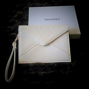 white wristlet bag